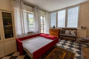 Кровать или кровати в номере The house on the river Wi-FiQCterme Quarenghi Clinic