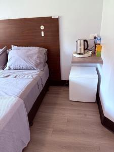 Ένα ή περισσότερα κρεβάτια σε δωμάτιο στο Darwin City Central - a cozy, budget one bedroom unit in complex in Darwin City!