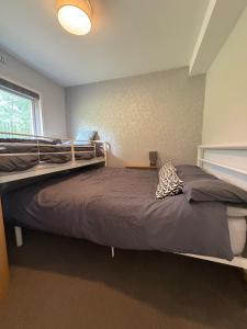 Voodi või voodid majutusasutuse Beautiful Snowdonia Chalet toas