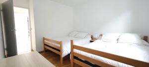 Postel nebo postele na pokoji v ubytování 10 couchages, proches station les Arcs, la Rosière