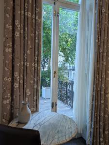 Balkón nebo terasa v ubytování Curzon House Hotel