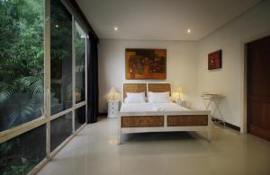 Ένα ή περισσότερα κρεβάτια σε δωμάτιο στο 3 Bedroom Villa with Private Pool in Berawa +33 φωτογραφίες