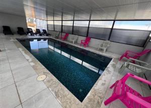 Bazén v ubytování סויטת עוצמת השלווה nebo v jeho okolí