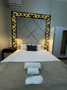 Postel nebo postele na pokoji v ubytování Baku City INN