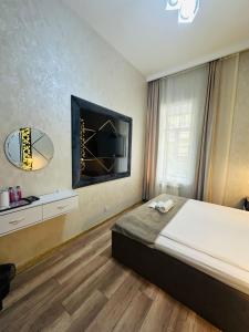 TV a/nebo společenská místnost v ubytování Baku City INN