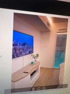 Una televisión o centro de entretenimiento en Baie marquet frontière monaco