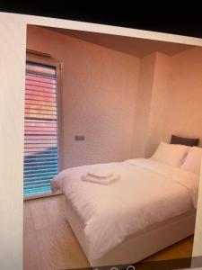 Una cama o camas en una habitación de Baie marquet frontière monaco