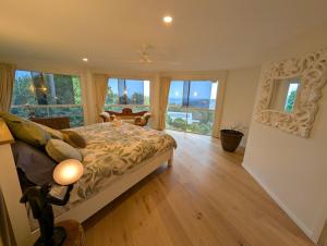 Ένα ή περισσότερα κρεβάτια σε δωμάτιο στο Mada Nature