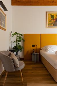 Postel nebo postele na pokoji v ubytování Tenuta Tommasi - Relais Bacco