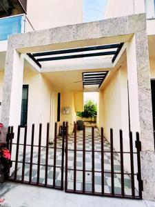 Φωτογραφία από το άλμπουμ του Villa A58 - Classic bedrooms σε Tirupporūr