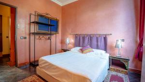 Ένα ή περισσότερα κρεβάτια σε δωμάτιο στο Villa Nafsi Aghmat Marrakech Piscine Chauffée