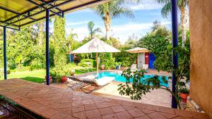 Πισίνα στο ή κοντά στο Villa Nafsi Aghmat Marrakech Piscine Chauffée