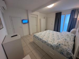 Ένα ή περισσότερα κρεβάτια σε δωμάτιο στο Armonia Luxury Apartment