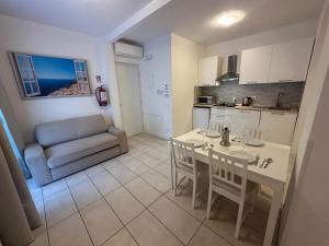 Η κουζίνα ή μικρή κουζίνα στο Armonia Luxury Apartment