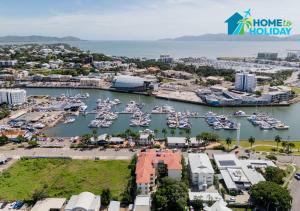 an aerial view of a harbor with boats in the water at Waterfront Studio Room Near City Stadium & Ferry in Townsville in Townsville