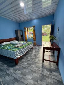 Ένα ή περισσότερα κρεβάτια σε δωμάτιο στο Lagundri holiday