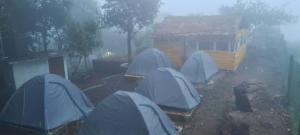 a group of tents in front of a house at Highrange tent camping in Vagamon