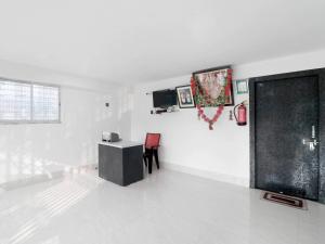 Μια τηλεόραση ή/και κέντρο ψυχαγωγίας στο Hotel O Shyam Guest House