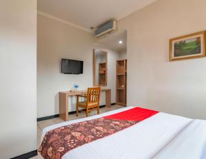 Μια τηλεόραση ή/και κέντρο ψυχαγωγίας στο Cihampelas Hotel 2