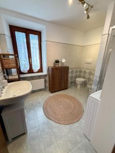 a bathroom with a sink and a toilet at Casa Montebello in Camaiore +65 photos