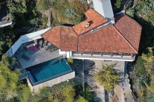 an overhead view of a house with a swimming pool at Casa Rondine by Fewotessin in Ronco s/Ascona - Porto Ronco