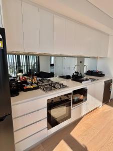 Η κουζίνα ή μικρή κουζίνα στο The Luxury Penthouse at Spring Square