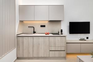 Η κουζίνα ή μικρή κουζίνα στο Thessaloniki Spot by Luxlikehome