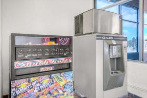 an atm machine with graffiti on the side of it at Motel 6-Van Horn, TX in Van Horn