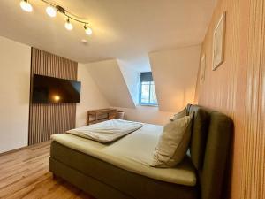 Postel nebo postele na pokoji v ubytování Ferienhaus am Beverinsee