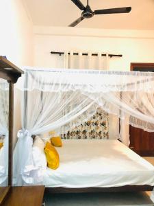 Ένα ή περισσότερα κρεβάτια σε δωμάτιο στο Azure bay +7 φωτογραφίες