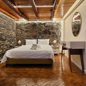 Ένα ή περισσότερα κρεβάτια σε δωμάτιο στο JoLi Larano - BBQ In