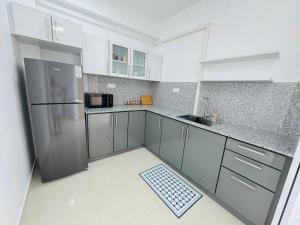 Kuchyň nebo kuchyňský kout v ubytování The Colombo Charm