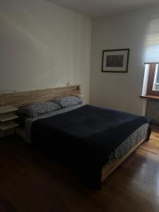 Postel nebo postele na pokoji v ubytování Cormòns 2#