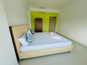 Postel nebo postele na pokoji v ubytování The Colombo Charm