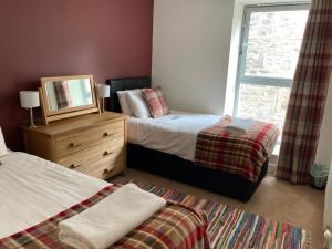 En eller flere senge i et værelse på Raven Wing 17 - Aonach Mor + 19 billeder