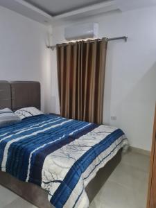 Postel nebo postele na pokoji v ubytování Mirage Bay Resort & Aqua Park