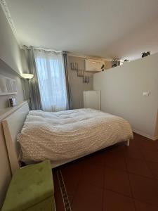 Ένα ή περισσότερα κρεβάτια σε δωμάτιο στο Suite Loggetta 2