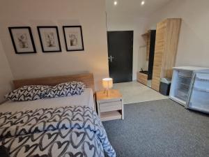 Postel nebo postele na pokoji v ubytování Willa Lawenda- Pokój Superior 7