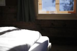 Voodi või voodid majutusasutuse Design Chalet Oberlech toas