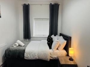 Postel nebo postele na pokoji v ubytování 2BR Home Cozy & Comfortable Stay in Accrington
