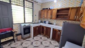 Η κουζίνα ή μικρή κουζίνα στο The Petrance Apartment +43 φωτογραφίες