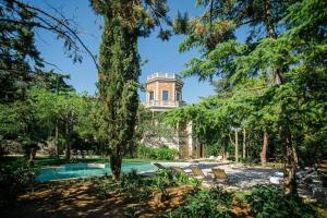 Bazén v ubytování Villa Rosa Resort nebo v jeho okolí