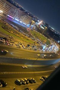 Nespecifikovaný výhled na destinaci Šardžá nebo výhled na město při pohledu z apartmánu