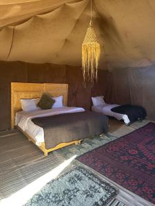 Ένα ή περισσότερα κρεβάτια σε δωμάτιο στο Le xury camp