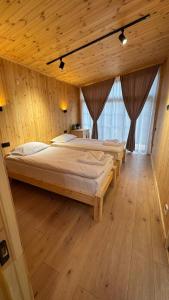 Postel nebo postele na pokoji v ubytování Antari Project