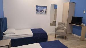 Postel nebo postele na pokoji v ubytování Armeni Apart Hotel