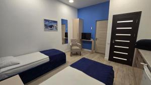 Postel nebo postele na pokoji v ubytování Armeni Apart Hotel