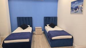 Postel nebo postele na pokoji v ubytování Armeni Apart Hotel