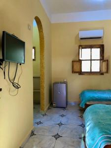 TV a/nebo společenská místnost v ubytování Arkan siwa أركان سيوة