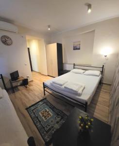 Ένα ή περισσότερα κρεβάτια σε δωμάτιο στο Byzanthin rooms